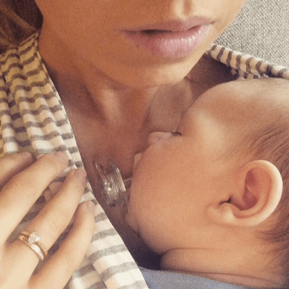 Baby Dexter sleeping on Mummy