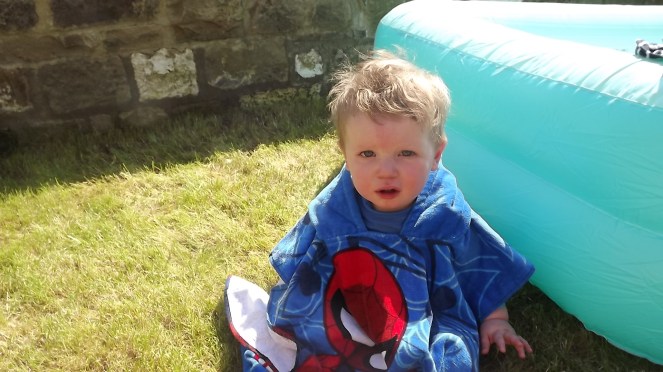 baby dexter paddling pool summer towel grumpy